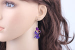 Dizzy Cat Earrings (Purple)